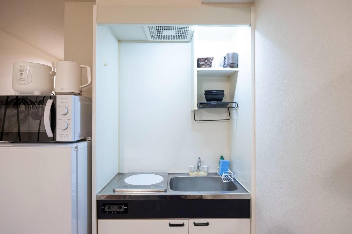 Ferienwohnung Shinjuku Okada Building Präfektur Tokio Exterior foto